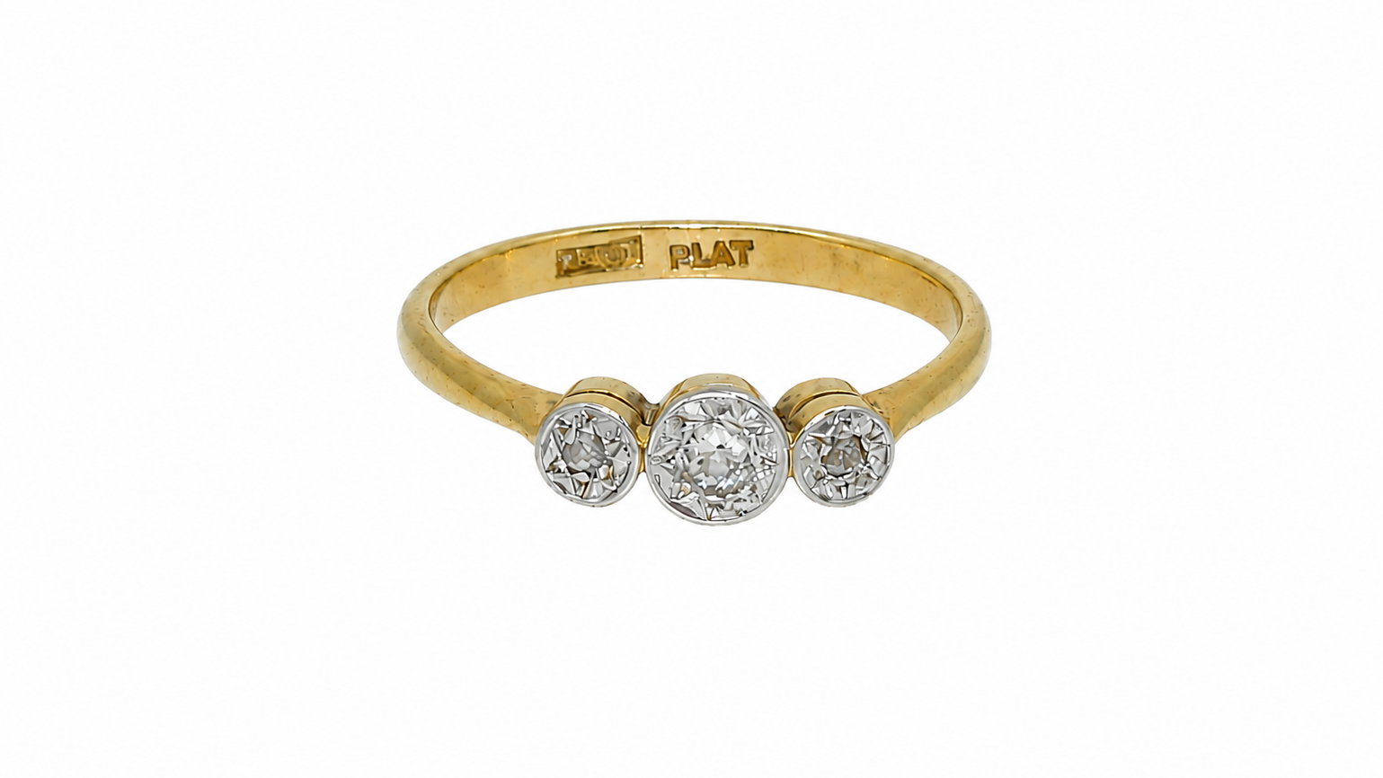 A vintage diamond illusion set trilogy ring