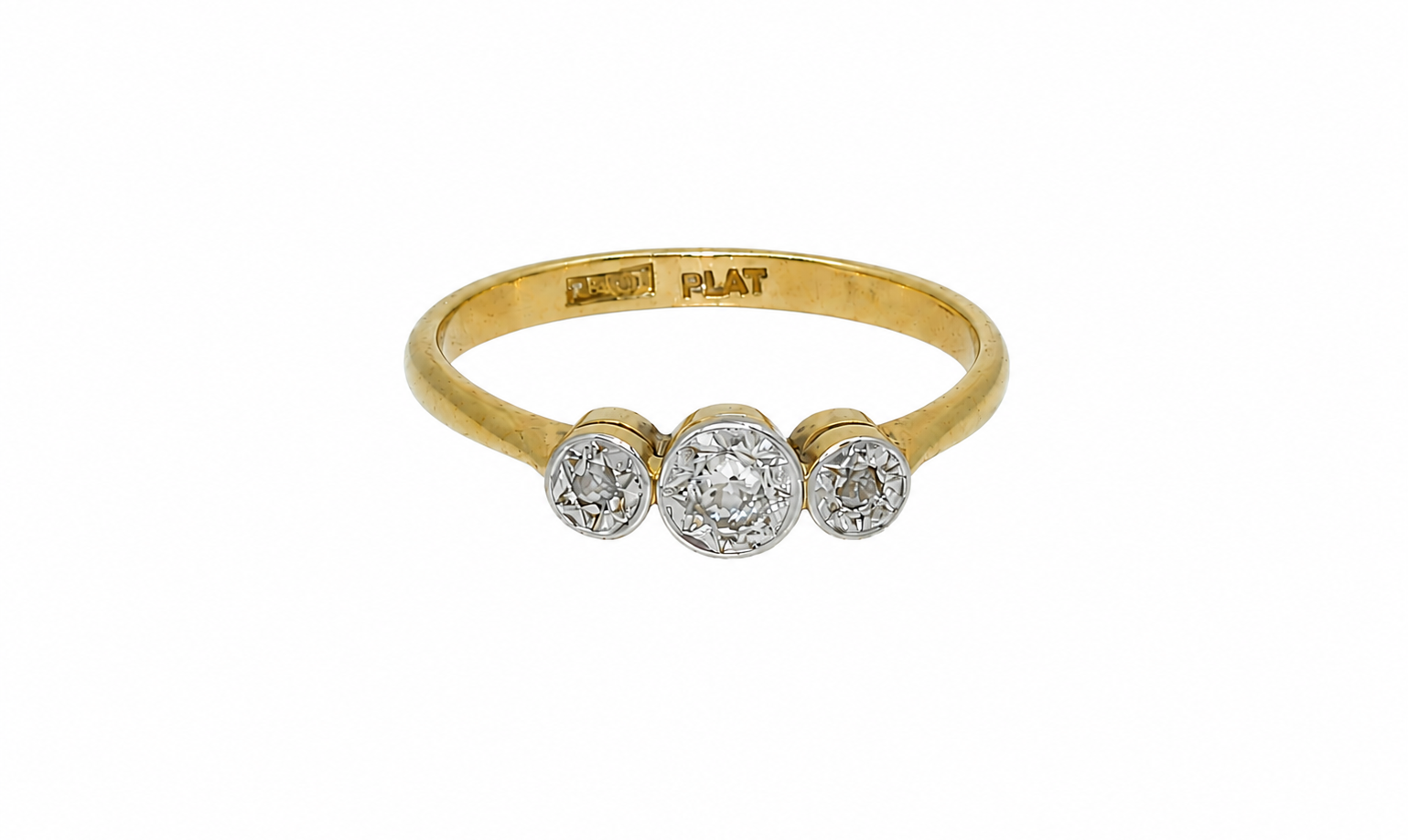 A vintage diamond illusion set trilogy ring