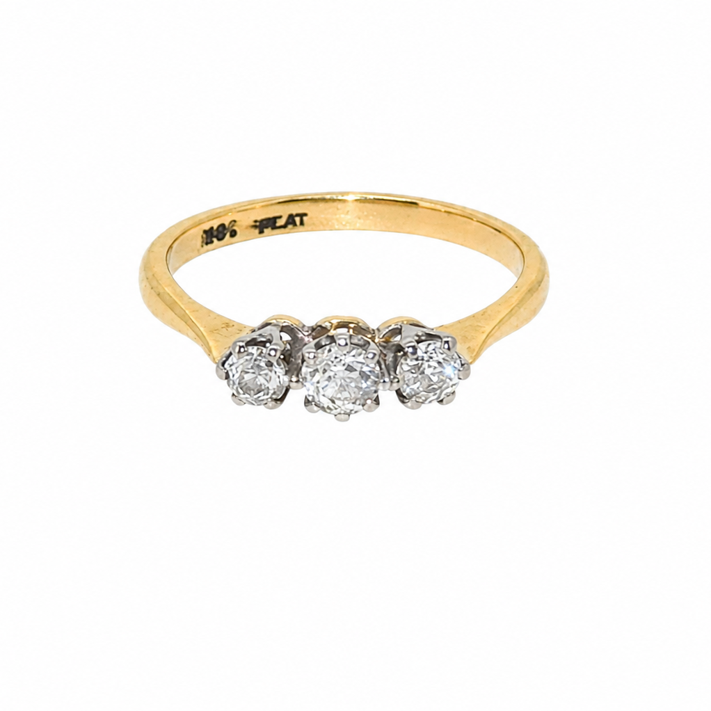 A vintage diamond trilogy ring