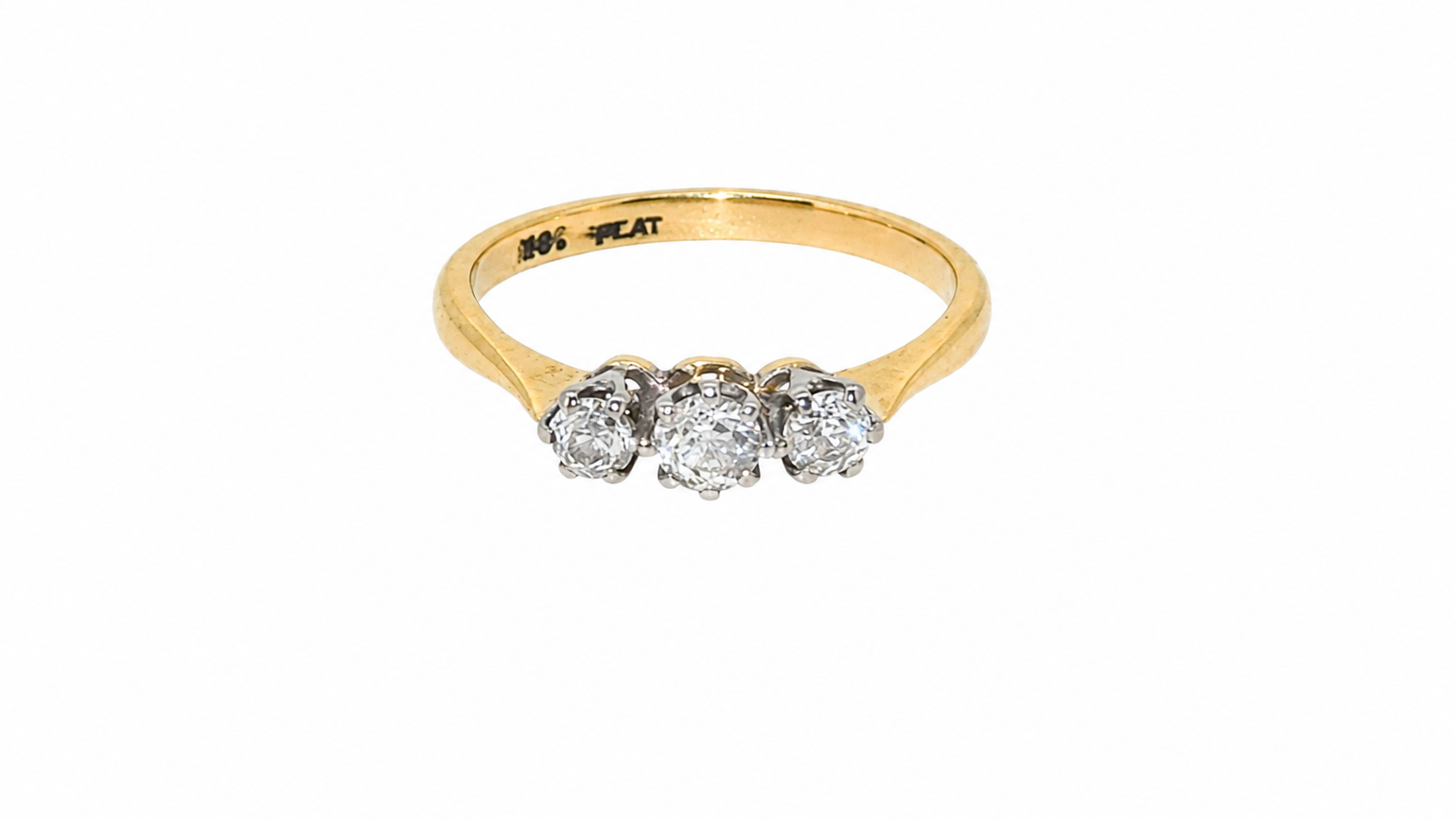 A vintage diamond trilogy ring