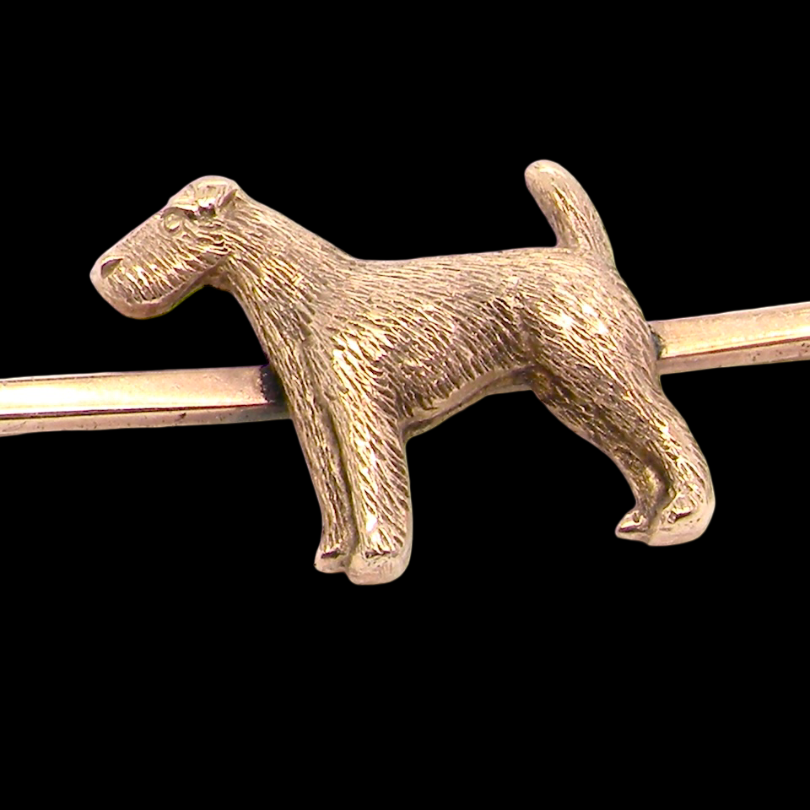 A vintage early 20th century bar brooch. The shape of a dog, possibly an Airdale terrier