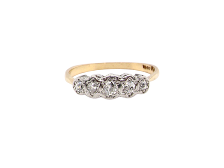 A vintage five stone diamond ring