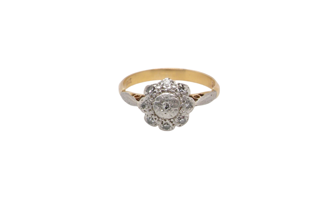A vintage illusion Diamond Cluster Ring