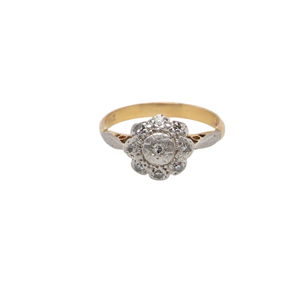 A vintage illusion Diamond Cluster Ring