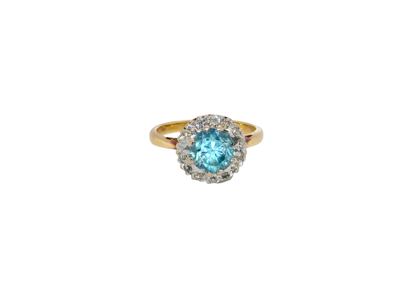 A vintage mid 20th century cluster ring.
Centre stone a natural blue zircon, 7mm diameter.