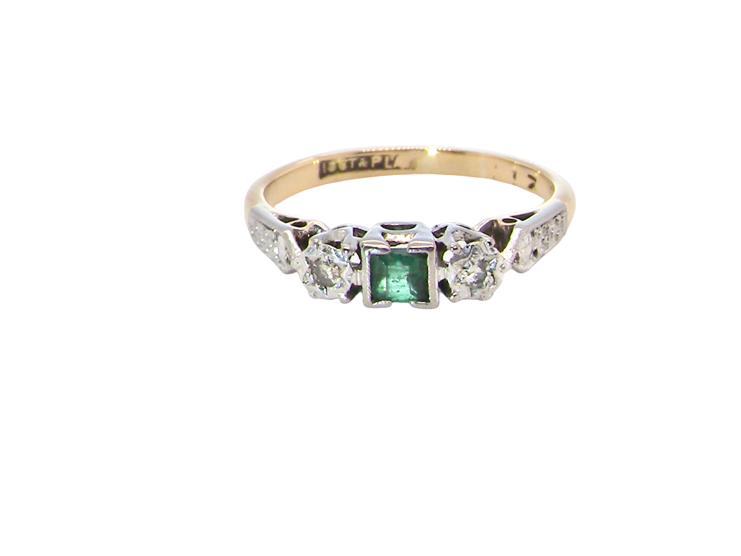 A vintage mid century ring. Centre stone a square emerald 3x3mm (0.15 carats est), rim setting.