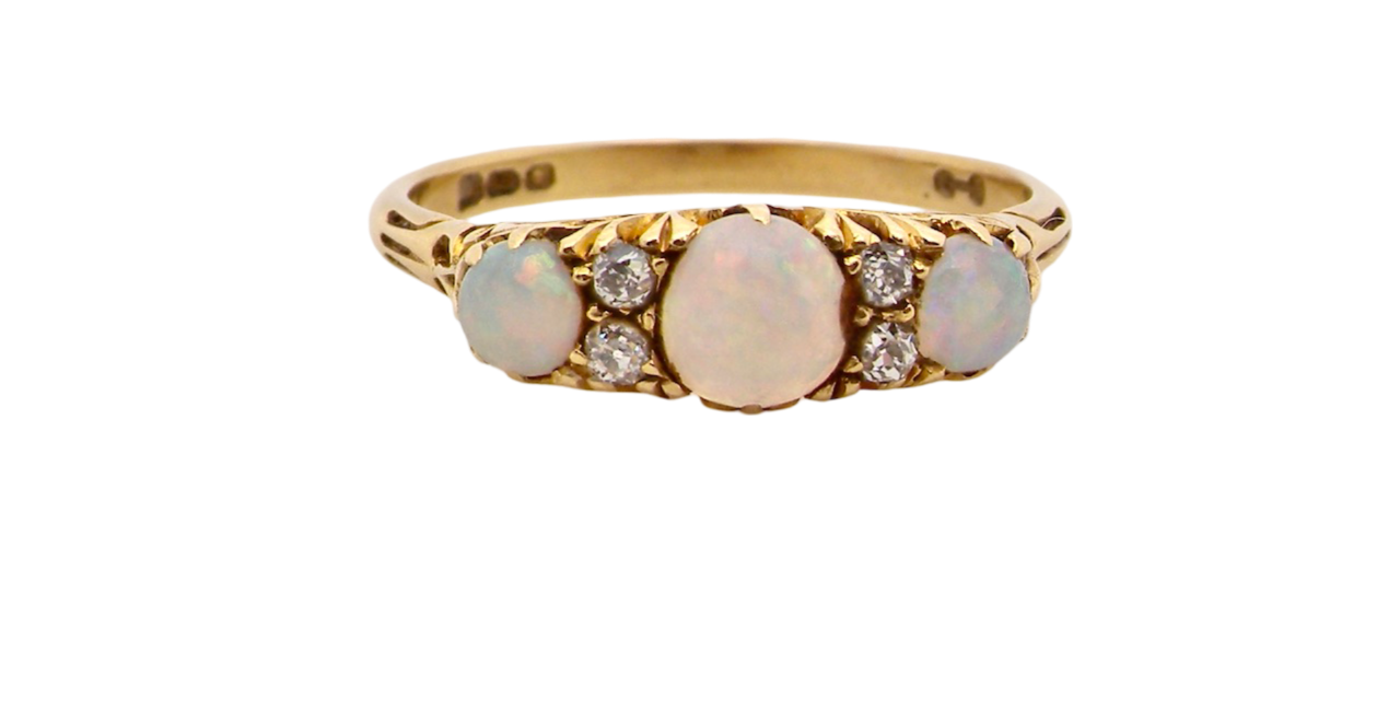 A vintage opal and diamond ring