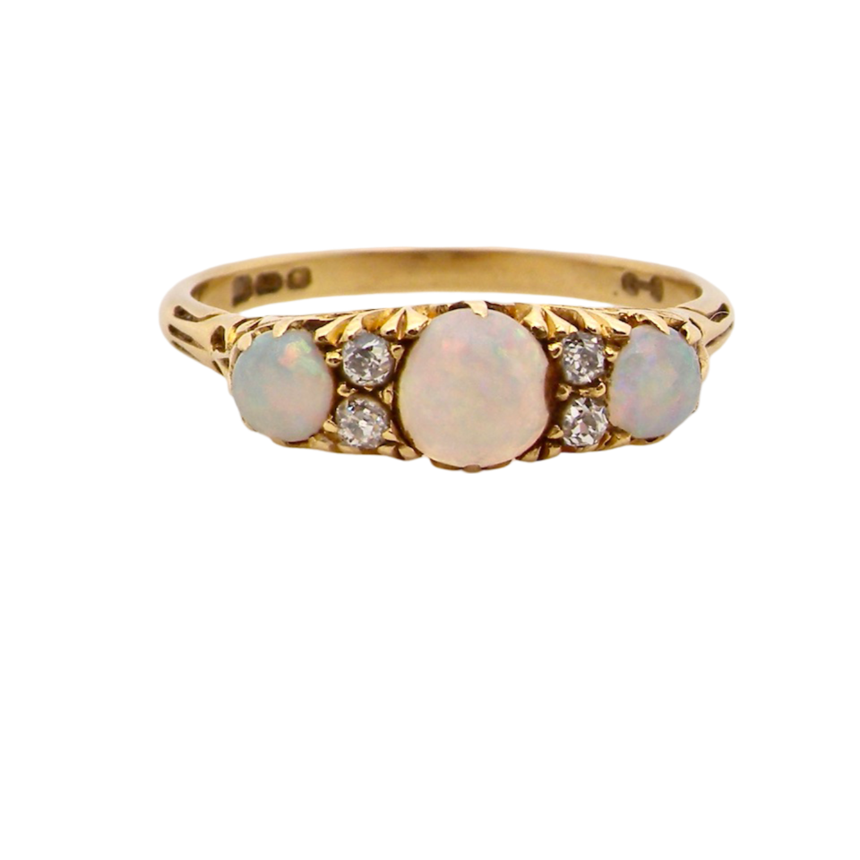 A vintage opal and diamond ring