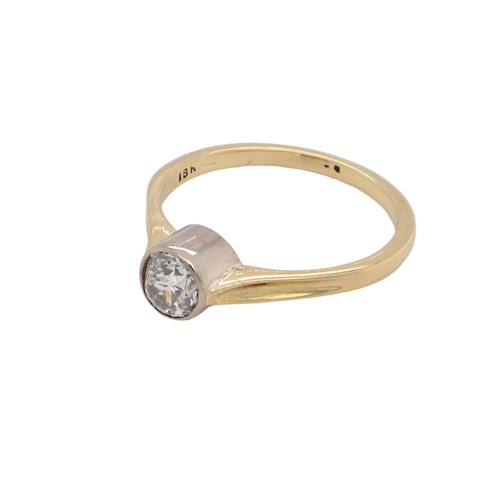 Gold ring with a diamond on a white background