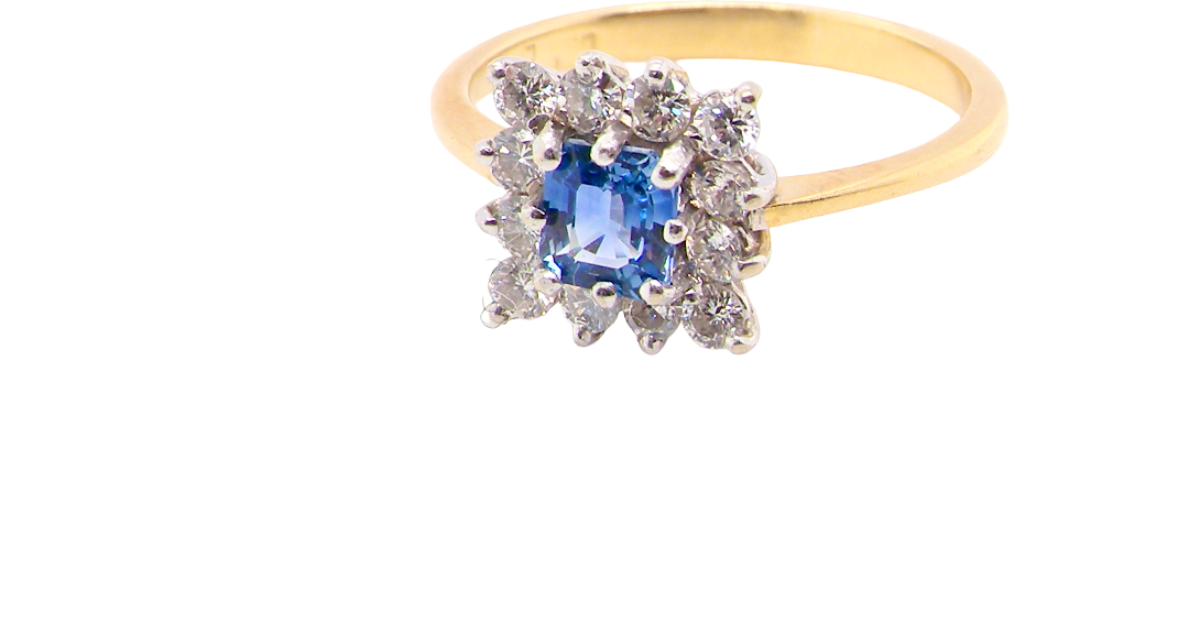A vintage square cluster ring. Features to the centre a square sapphire 5x5mm (est 0.50 carats) cornflower hue. 