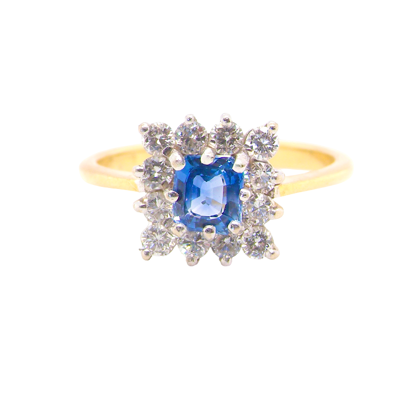 A vintage square cluster ring. Features to the centre a square sapphire 5x5mm (est 0.50 carats) mid blue-