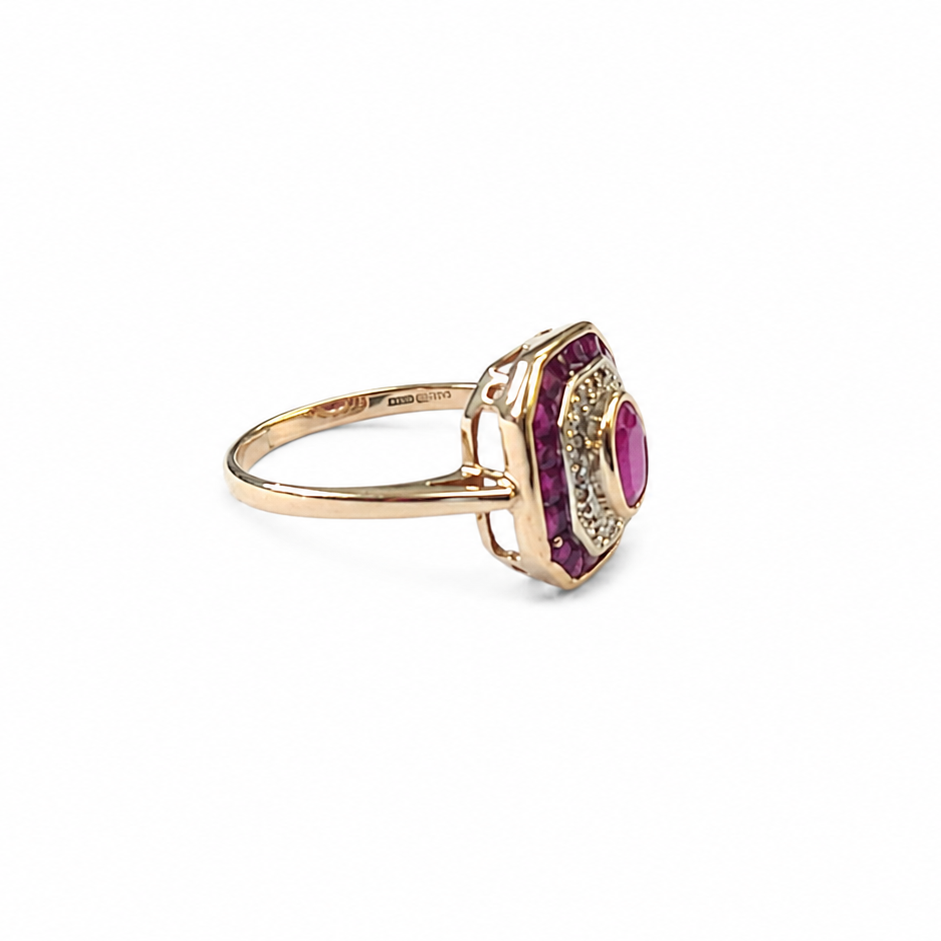 A vintage style ruby diamond cluster ring