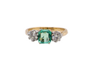 A vintage three stone Emerald and Diamond ring