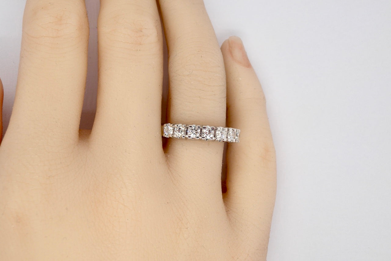 A white gold Diamond Eternity Ring finger view