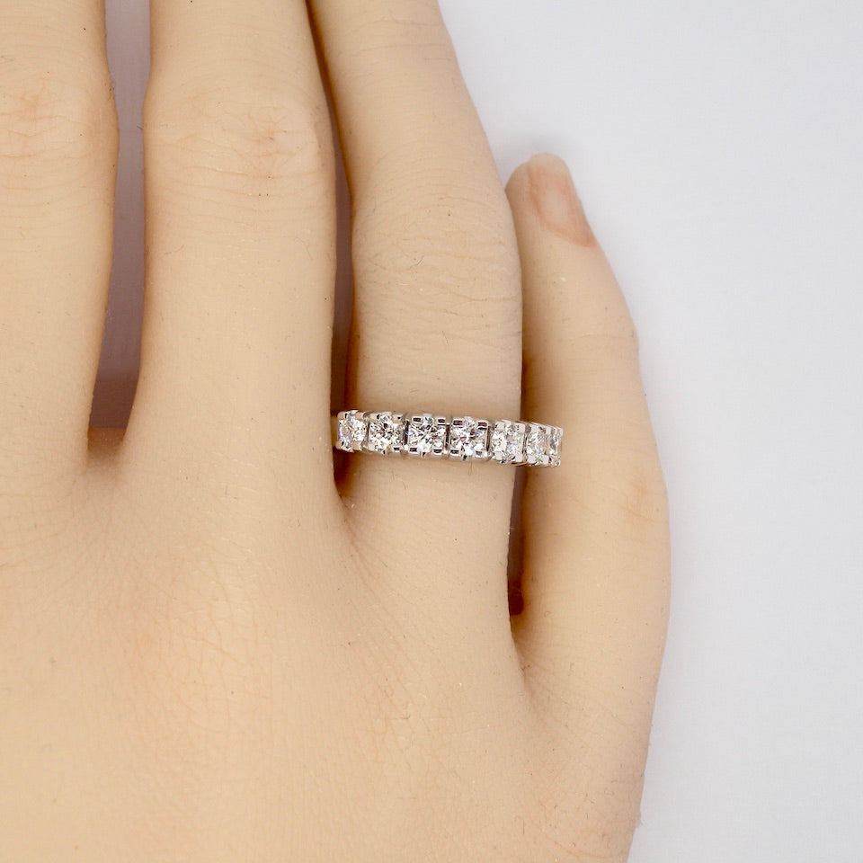 A white gold Diamond Eternity Ring finger view