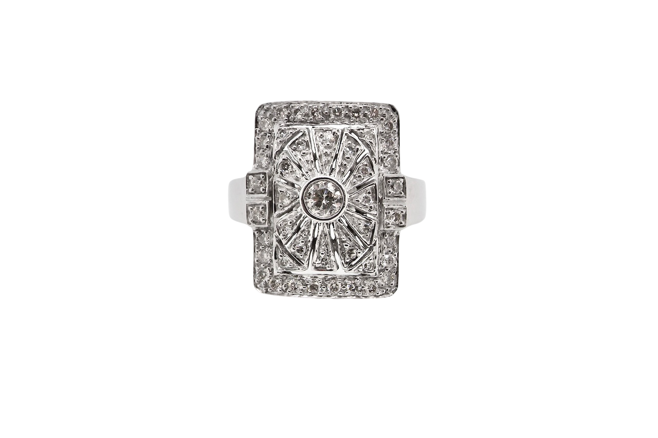 white gold ring with diamond accents on a white background