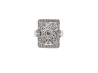 white gold ring with diamond accents on a white background