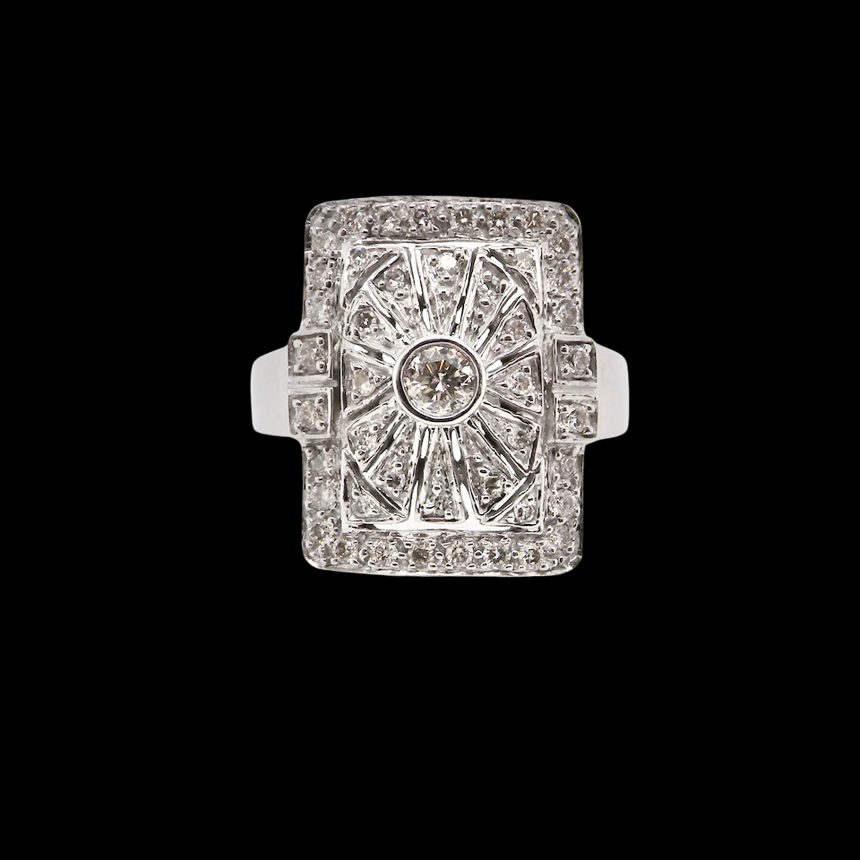 Diamond ring with a central gemstone and diamond-studded band on a black background