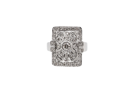 white gold ring with diamond accents on a white background