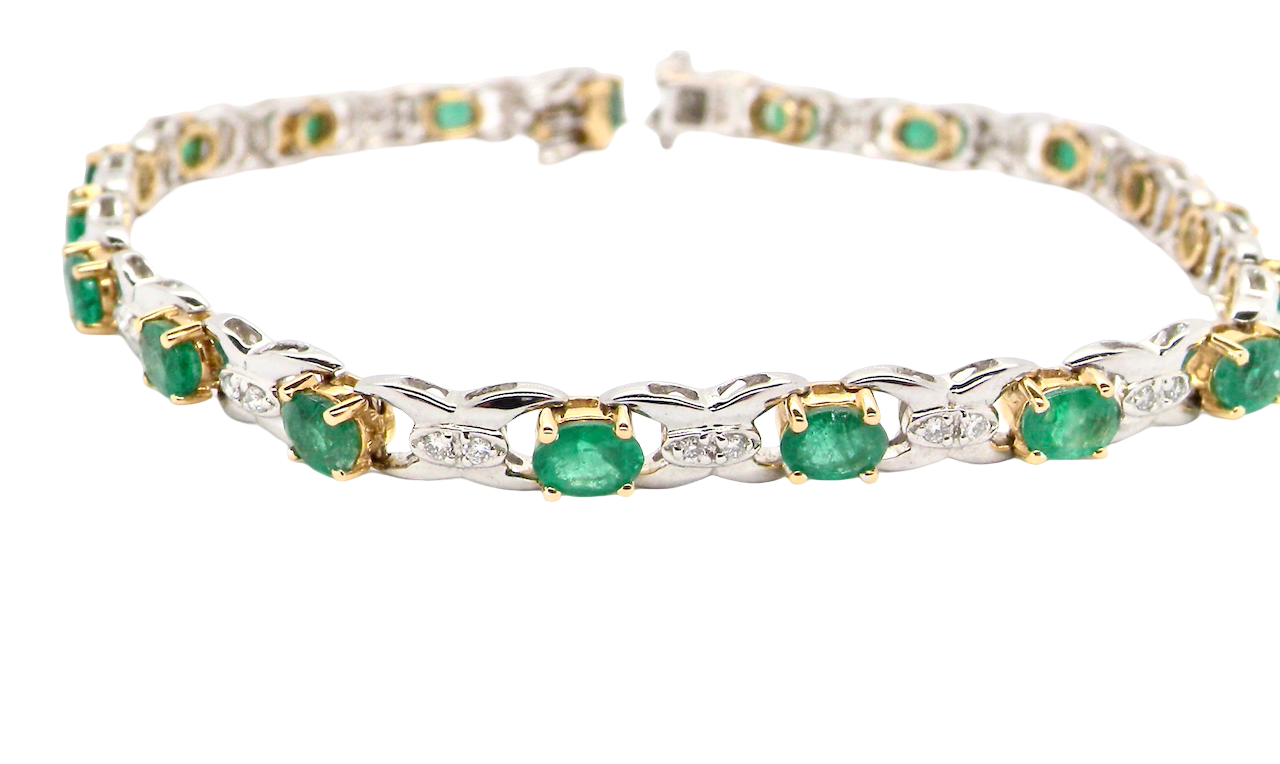 A white gold Emerald and Diamond bracelet