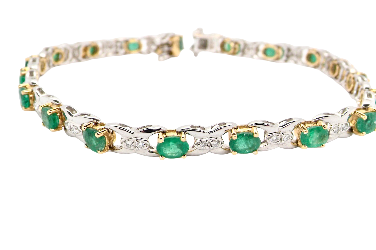 A white gold Emerald and Diamond bracelet