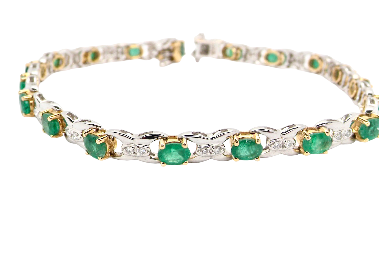 A white gold Emerald and Diamond bracelet