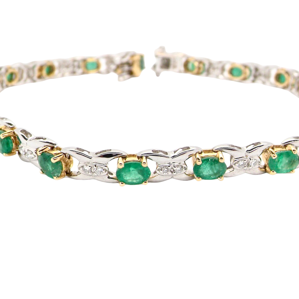 A white gold Emerald and Diamond bracelet
