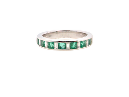 A NEW white gold Emerald and Diamond eternity ring