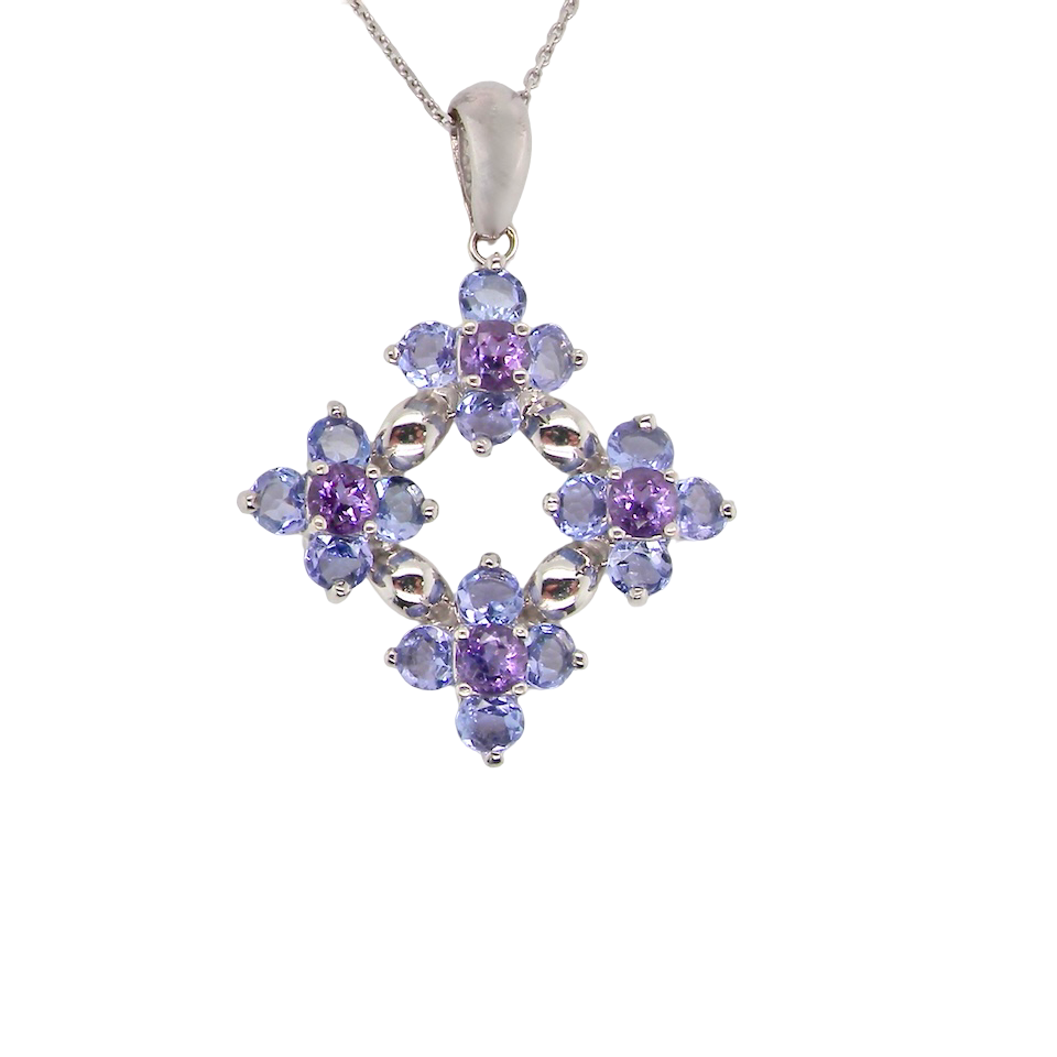 A white gold amethyst and tanzanite pendant