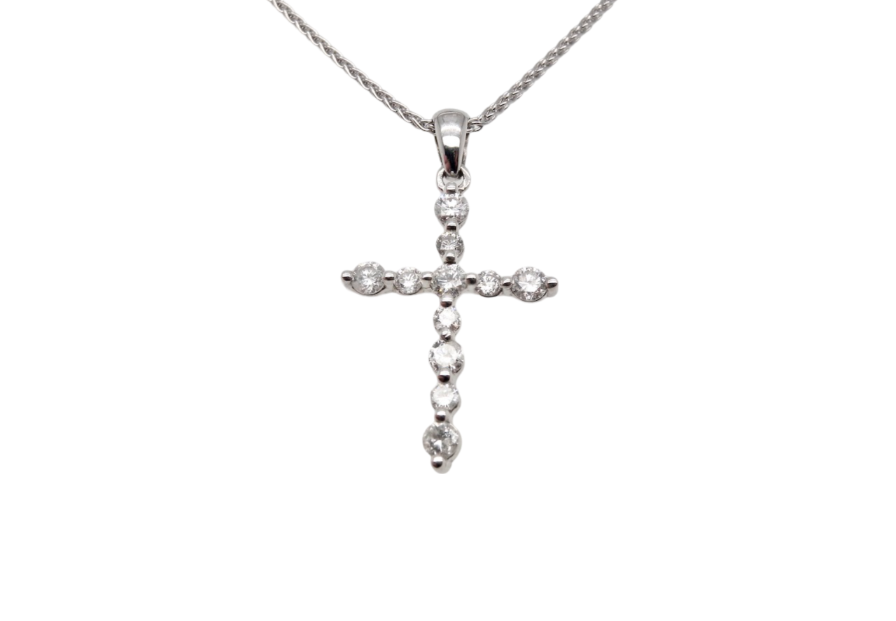 A white gold diamond cross