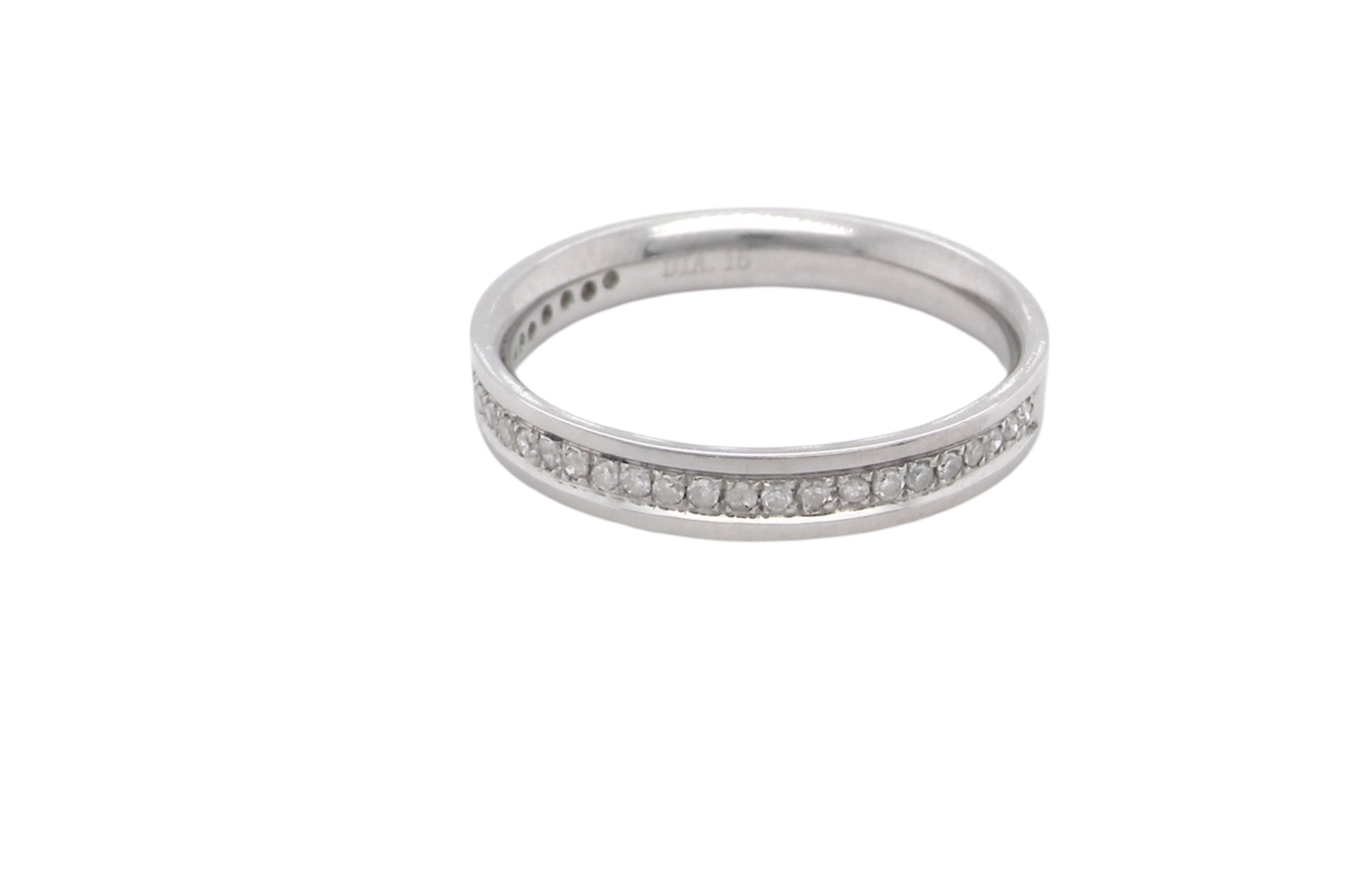 A white gold half hoop Diamond eternity ring
