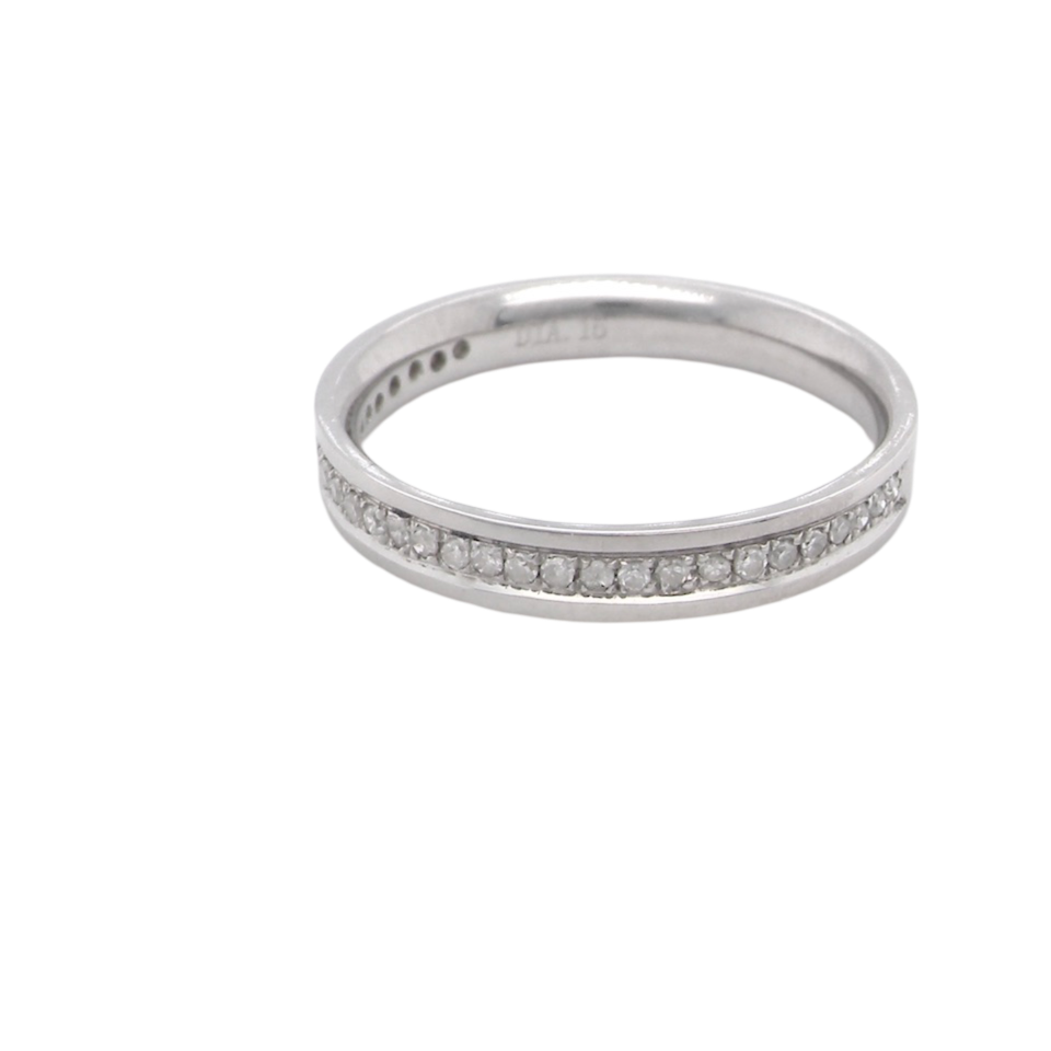 A white gold half hoop Diamond eternity ring