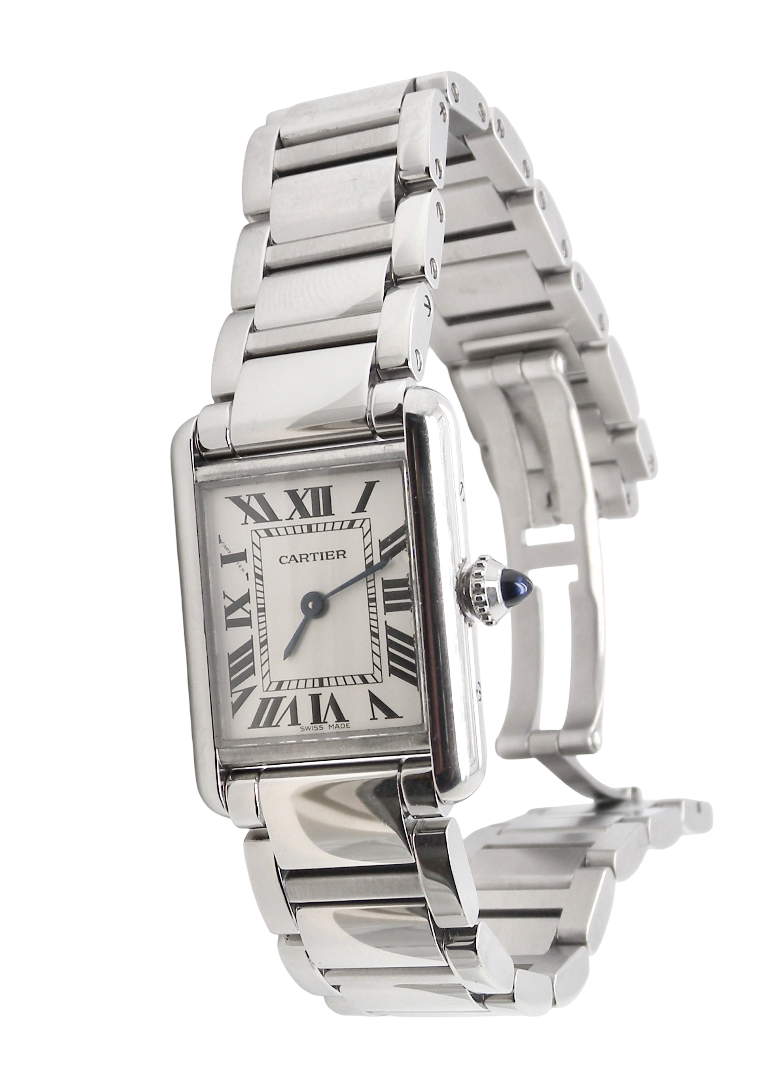 A womans stainless steel Cartier Tank Must wrist watch. Model number WSTA0051.
Silver coloured dial with Roman Numerals. Blue steeled hands. Case measures 29.5x22mm, case thickness 6.6mm. Quartz