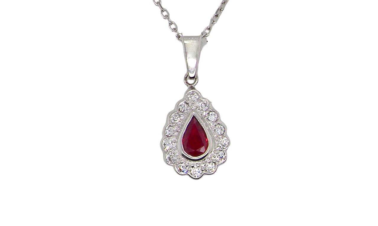 An 18 Carat White Gold Ruby and Diamond Pendant