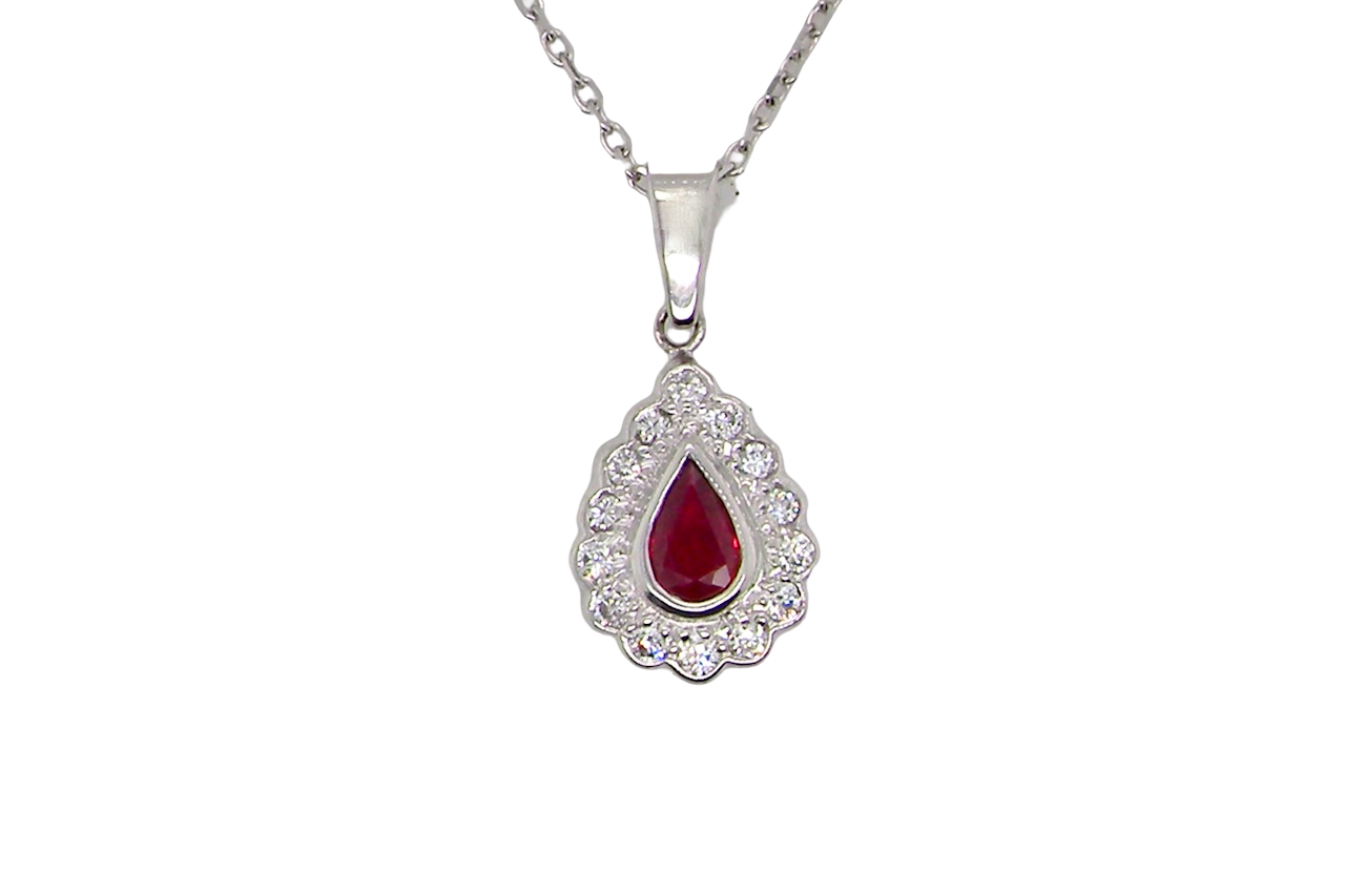 An 18 Carat White Gold Ruby and Diamond Pendant