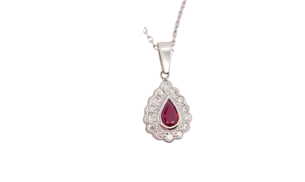 An 18 Carat White Gold Ruby and Diamond Pendant