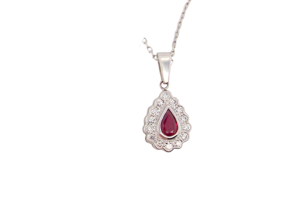 An 18 Carat White Gold Ruby and Diamond Pendant