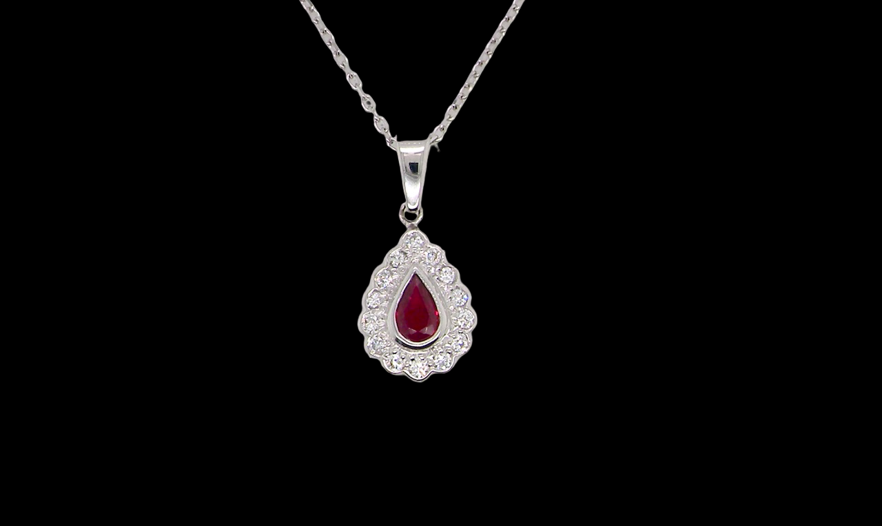 An 18 Carat White Gold Ruby and Diamond Pendant
