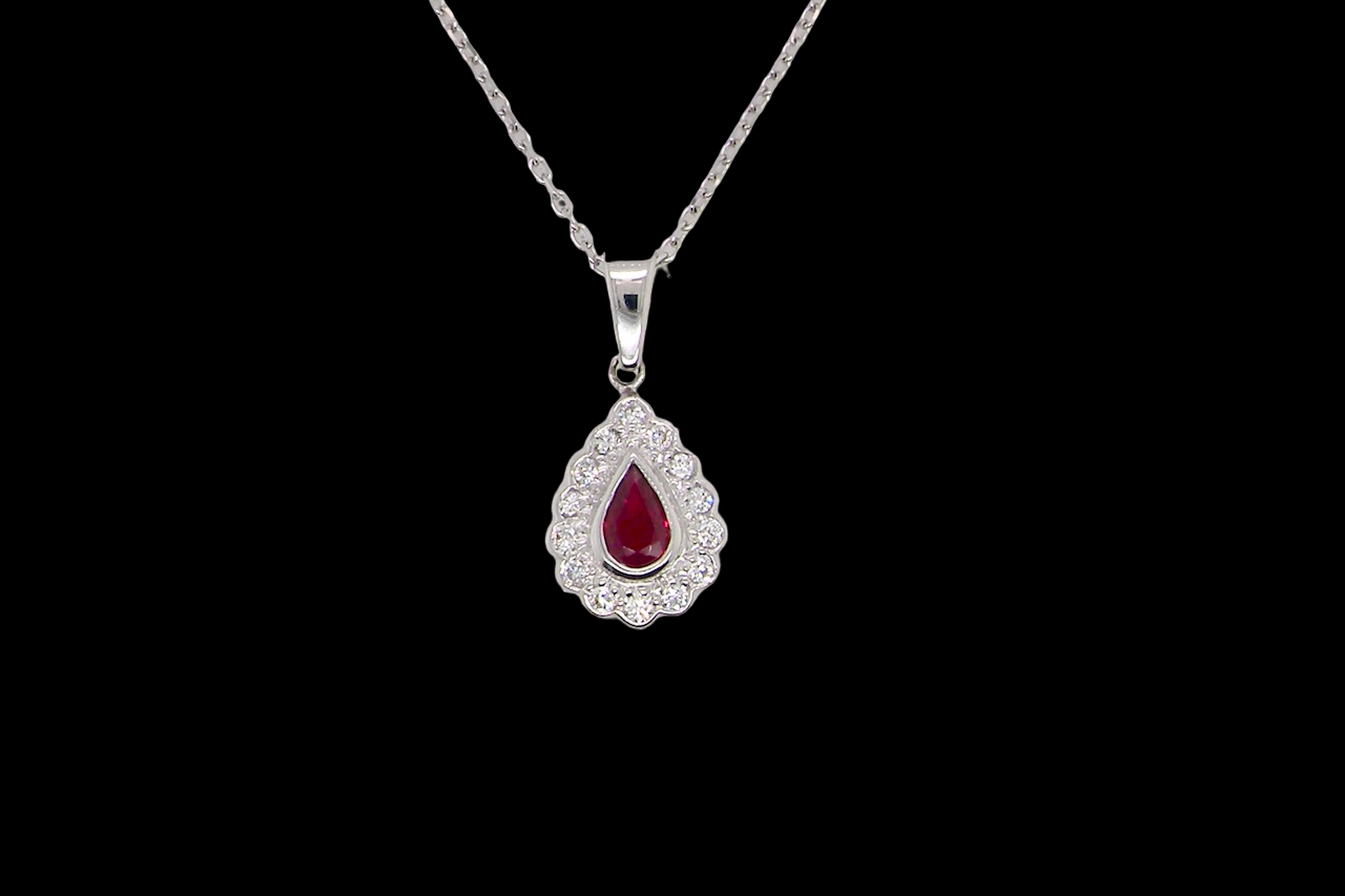 An 18 Carat White Gold Ruby and Diamond Pendant