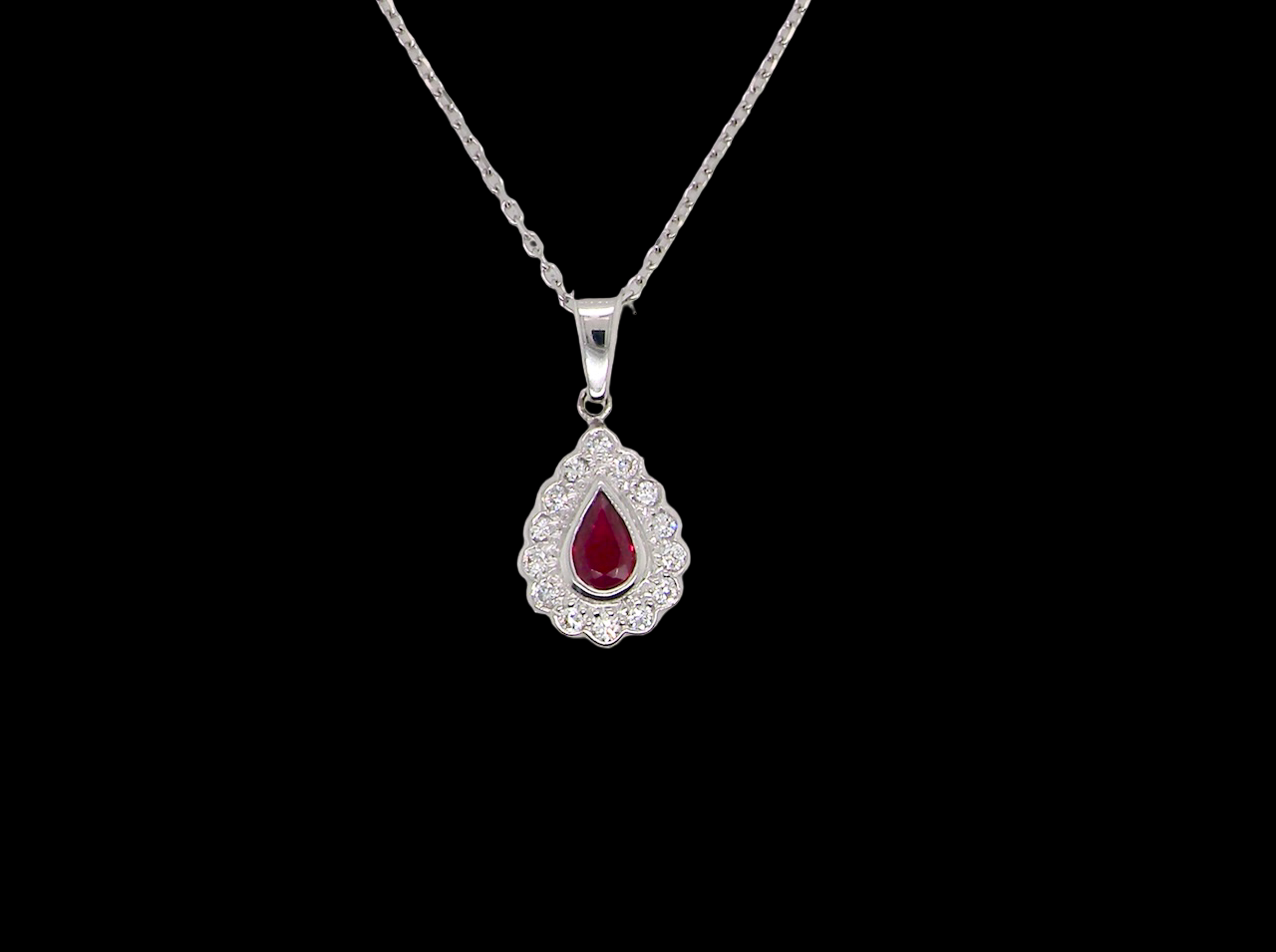 An 18 Carat White Gold Ruby and Diamond Pendant