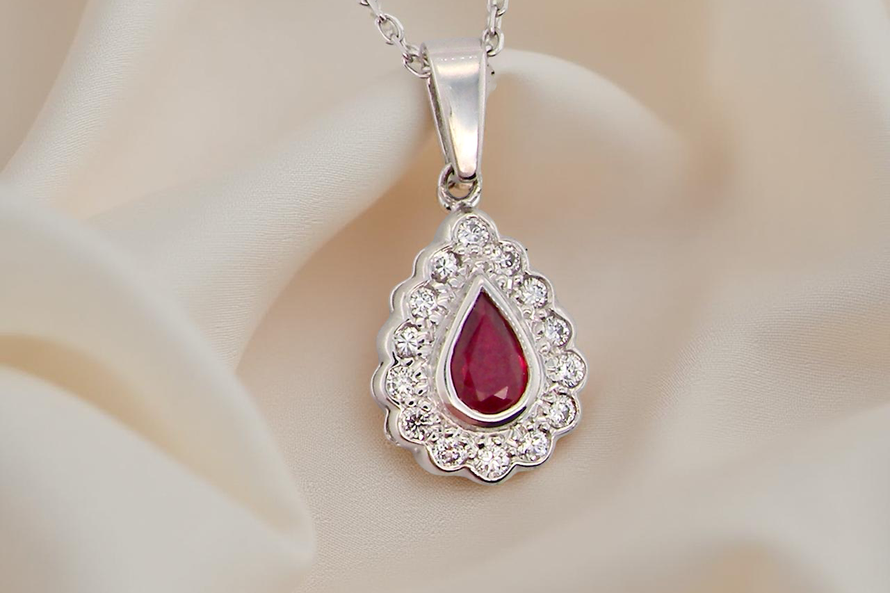 An 18 Carat White Gold Ruby and Diamond Pendant