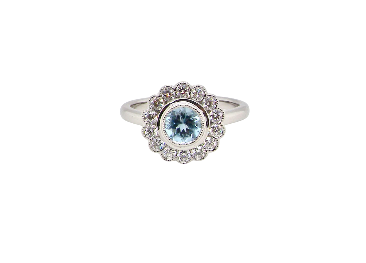 An 18 carat White Gold Aquamarine Diamond Cluster Ring