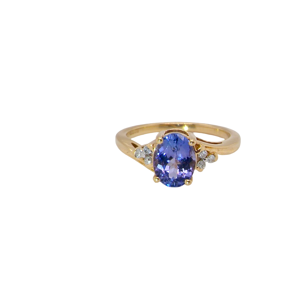 An 18 carat Yellow Gold Tanzanite and Diamond Ring