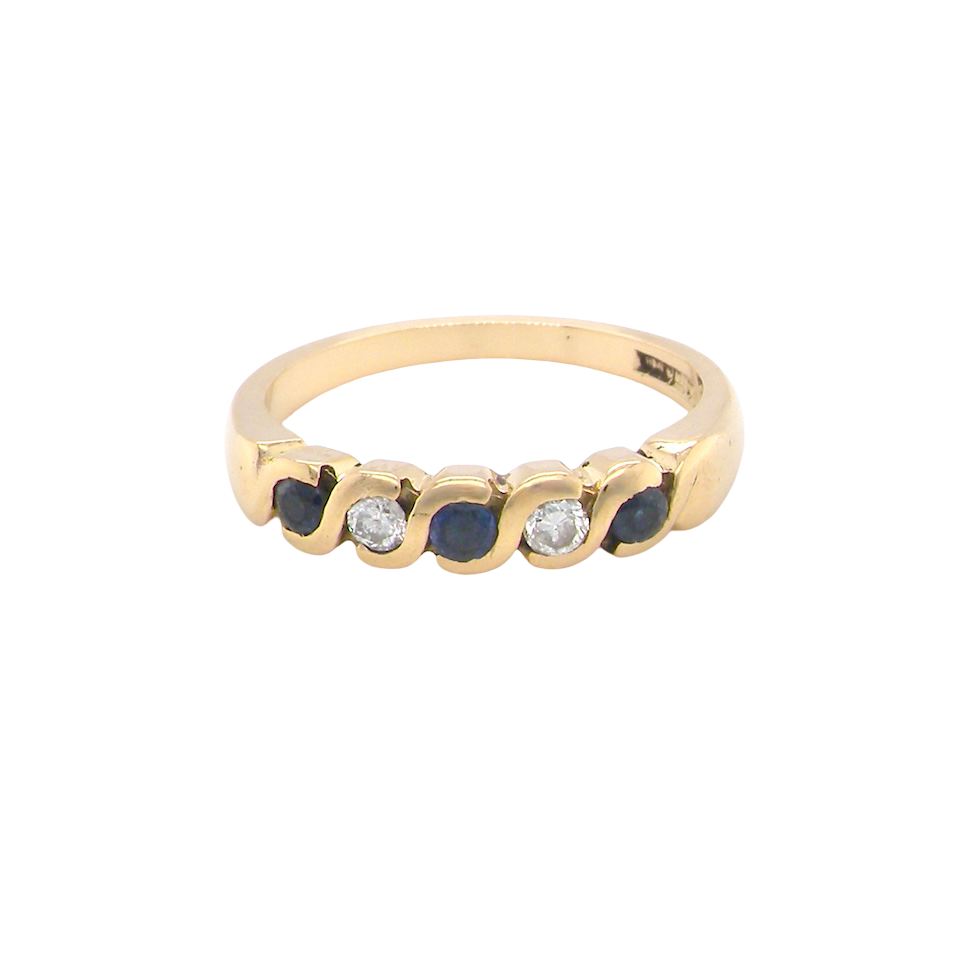 An 18 carat gold Sapphire and Diamond eternity ring