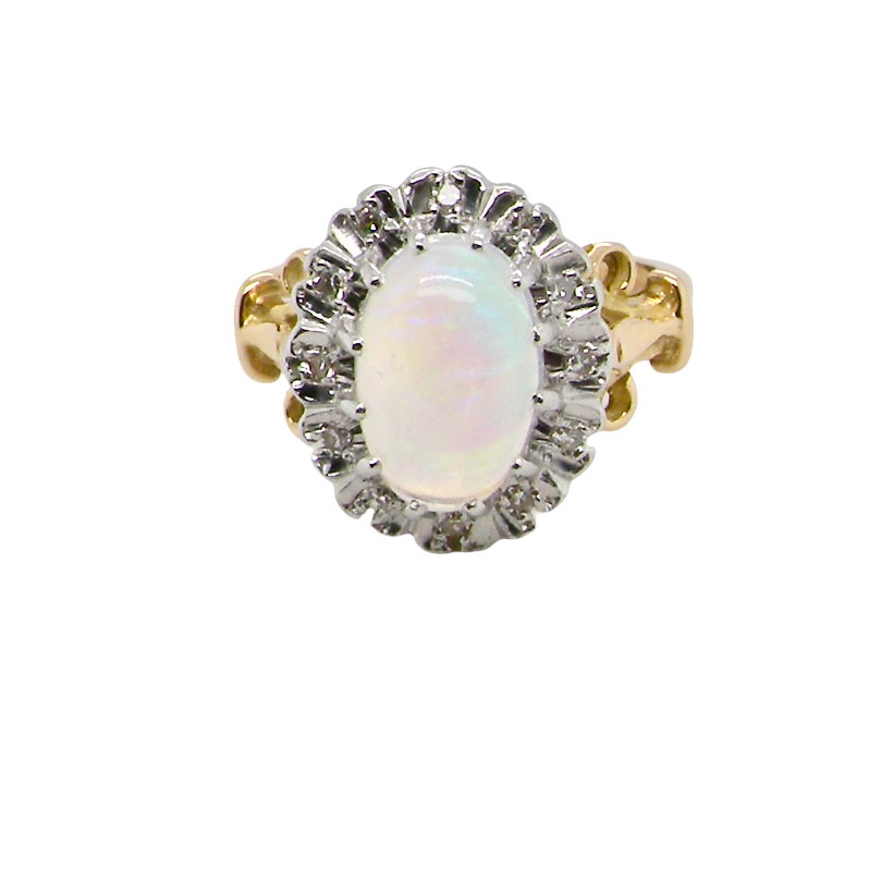 An 18 carat gold cluster ring. Features an oval opal centre stone with excellent play of colour with a predominance of watery purple and flashes of orange, and luminous green.
Measures 11x7mm.