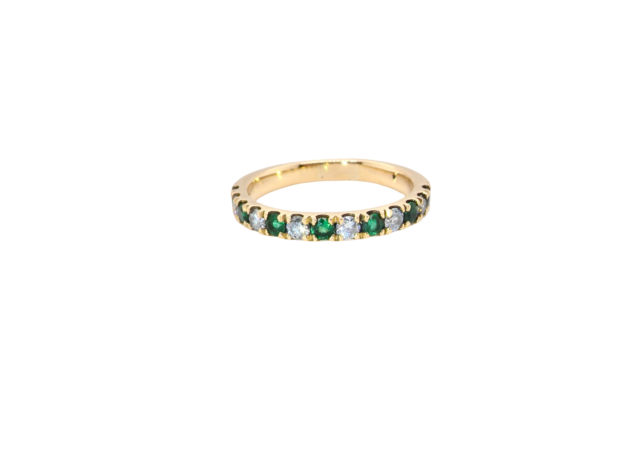An 18 carat gold half-hoop eternity ring, set with six round-cut emeralds
