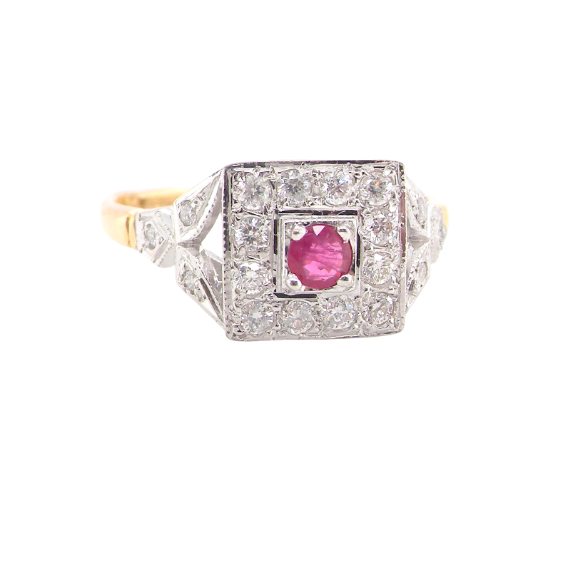 An 18 carat gold square cluster that features to the centre a round ruby and an outer halo of white diamonds.
