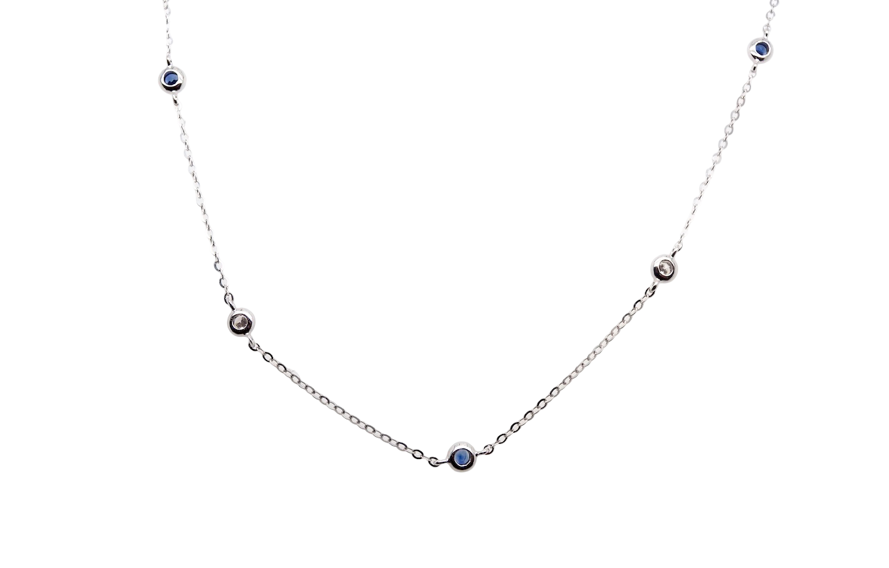 An 18 carat white gold necklace set with miniature precious gemstones.