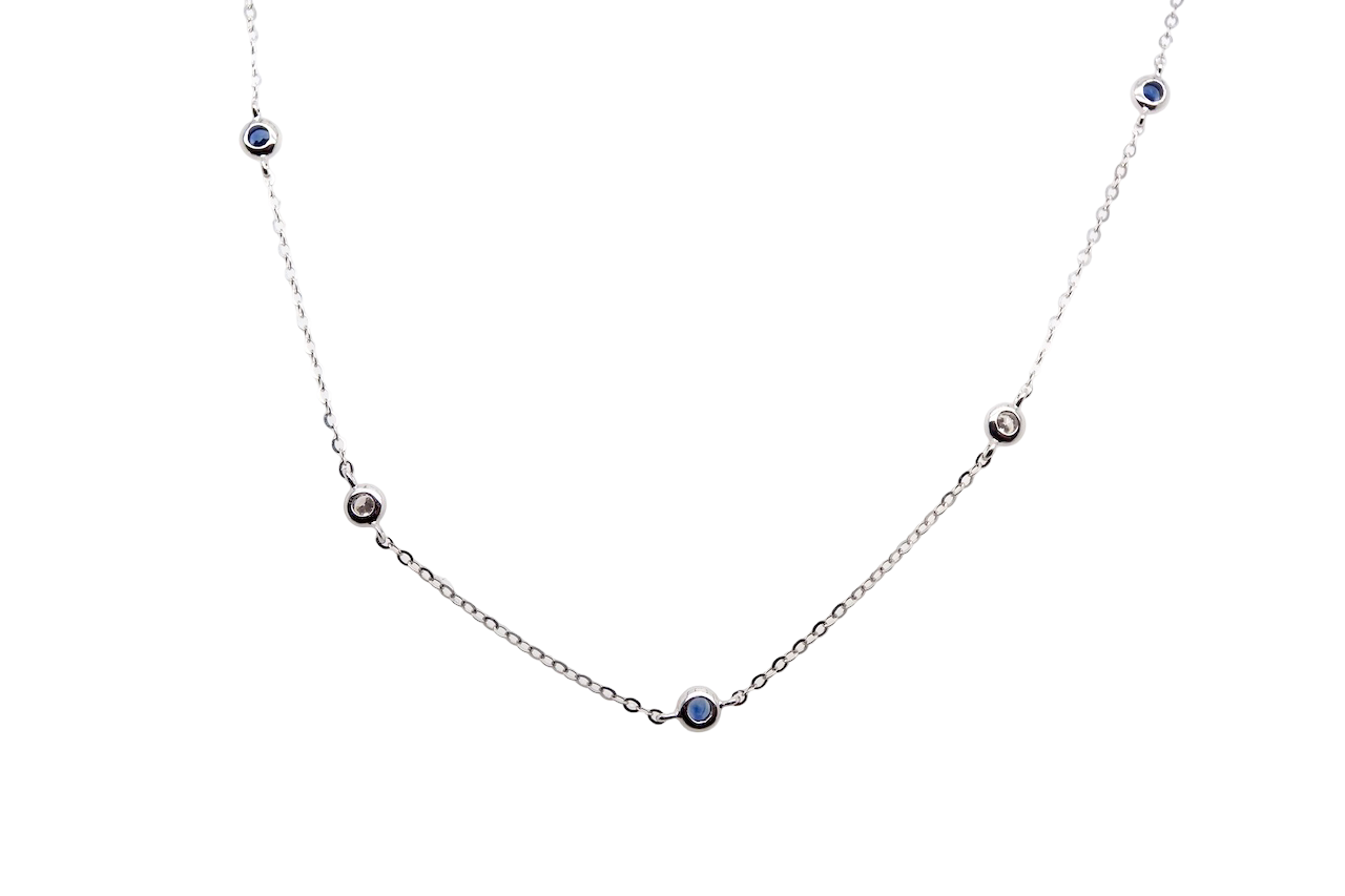 An 18 carat white gold necklace set with miniature precious gemstones.