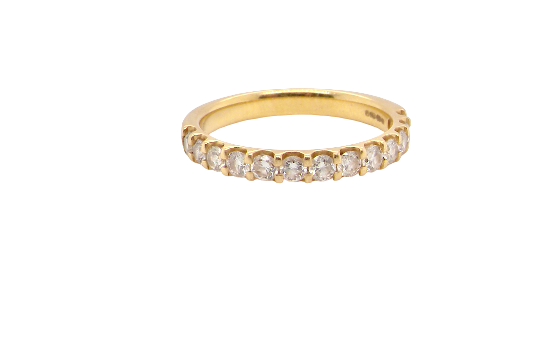 An 18 carat yellow gold half hoop diamond eternity ring originally purchased from Goldsmiths (original boxes supplied)